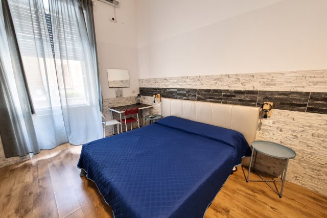 Scrivania e zona lavoro della camera T-Premium